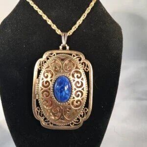 Vintage AVON Yesteryear Picture Locket with Faux Blue Stone Cabachon Center Gold